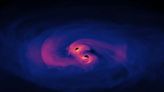 Merging black holes show us what happens when galaxies collide