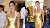 Bella Hadid Plays Up Patterns in Vintage Yellow Versace Silk Minidress at Cannes Film Festival 2024