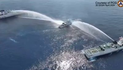 Chinese coast guard fires water cannons at Philippine vessels in the latest South China Sea incident