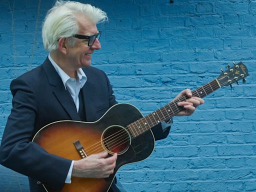 'I’d give the album a solid 7 out of 10... a high score for me,' says Nick Lowe