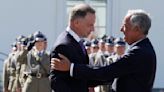 Poland's leader says Russia's moving tactical nuclear weapons to Belarus, shifting regional security
