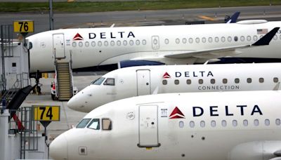 Delta's flight disruptions hit its premium brand image
