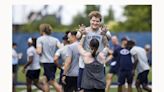 ODU football team welcomes Navy pilots for workout