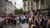 Crowds across France show solidarity at town halls targeted in rioting following police shooting