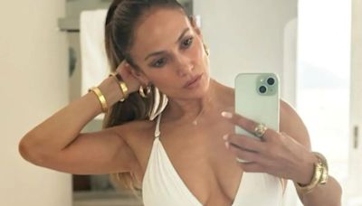 "This Is" Jennifer Lopez At 55 Who Looks Terrific In A White Halter Swimsuit