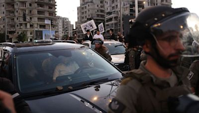 Ultra-Orthodox Jewish protesters attack Israeli minister’s car amid anger at military draft ruling