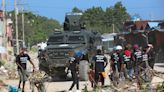 Haitian prime minister tours Port au Prince hospital after police take back from gang control