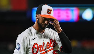 Orioles option Tate and select Smith's contract