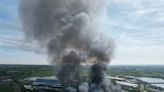 Cannock fire: Firefighters warn over toxic contents at parcel warehouse as they battle huge blaze