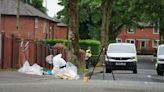 Forensic officers comb street as man fights for his life in hospital after attack