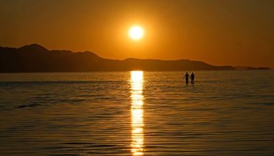 Being near water can be beneficial for mental health. See photos of the world’s swimming pools and lakes