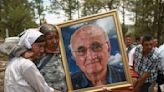 2 priests killed in northern Mexico buried in village