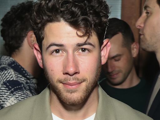 Nick Jonas Debuts Shaved Head in New Photo With Daughter Malti Marie - E! Online