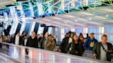 A Thanksgiving tradition returns: busy roads, crowded airports