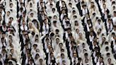 Mass weddings and cult accusations: Who are the 'Moonies' and what is the Unification Church?