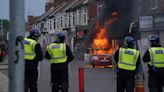 Which countries have issued travel warnings to citizens over UK riots?