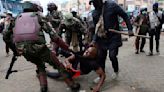 Police in Kenya fire tear gas at protesters as new Cabinet ministers are sworn in