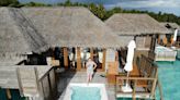 I stayed at a luxurious overwater bungalow in the Maldives and a budget option. I had a great time for less than $100 a night.