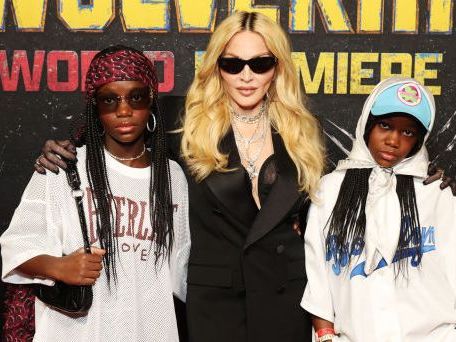 Madonna makes surprise red carpet appearance with twin daughters