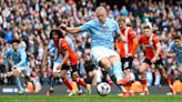 Man City hammer Luton to move top