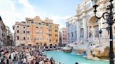 A bizarre video shows a tourist climbing into Rome's famed Trevi Fountain to fill up her water bottle