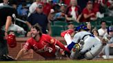 Cardinals rally in the eighth and then hold off Cubs for a 7-6 victory