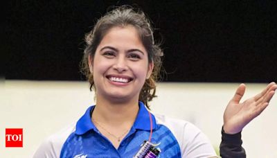 Watch: Manu Bhaker’s priceless reaction while receiving India's first medal at Paris Olympics 2024 | Paris Olympics 2024 News - Times of India