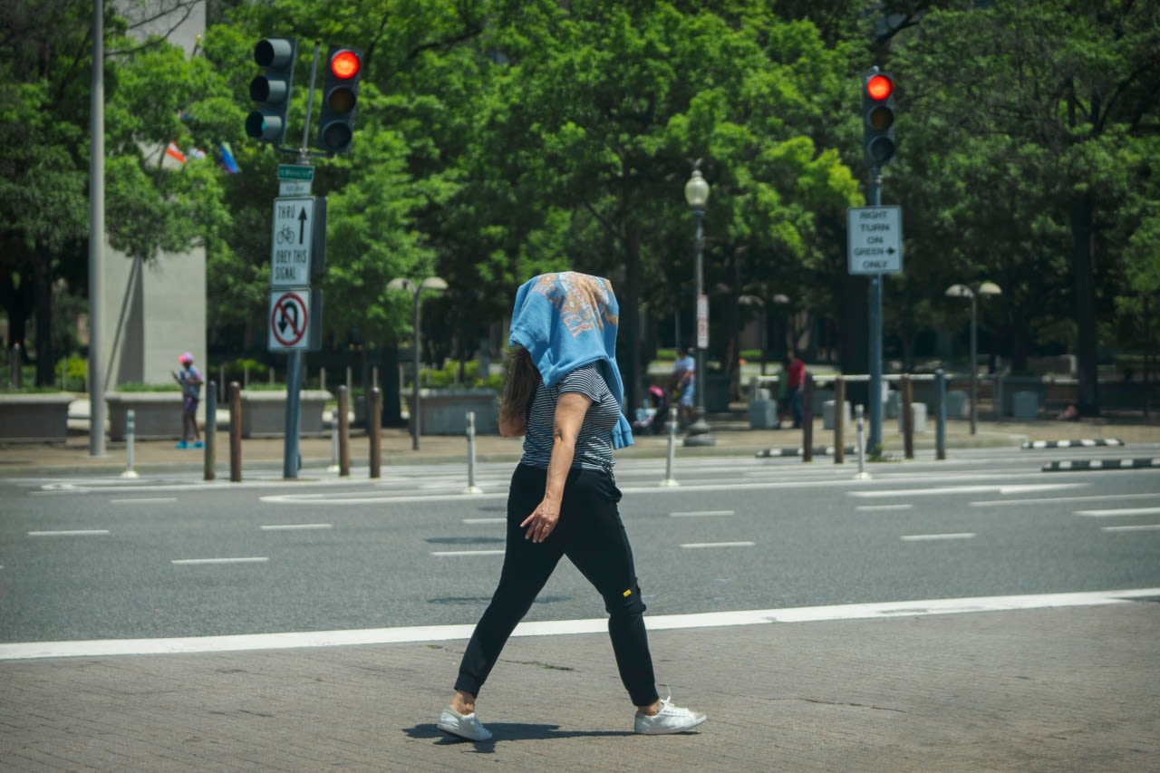 Millions sweating it out as heat wave nears peak from Midwest to Maine