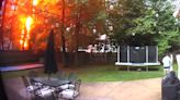 Watch: New York man, dog narrowly escape danger as lightning strikes backyard tree