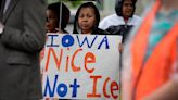 Justice Department warns it plans to sue Iowa over new state immigration law