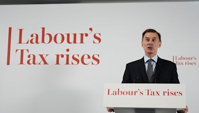 Hunt declines to guarantee tax cuts but insists burden will go down under Tories