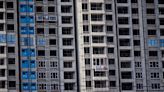 China's mortgage rate cuts spur prepayment rush, threaten bank earnings
