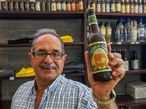 Palestinian brewery persists as Israeli curbs bite in wartime