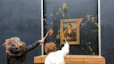 Mona Lisa painting targeted by protesters who throw pumpkin soup at da Vinci painting in Paris