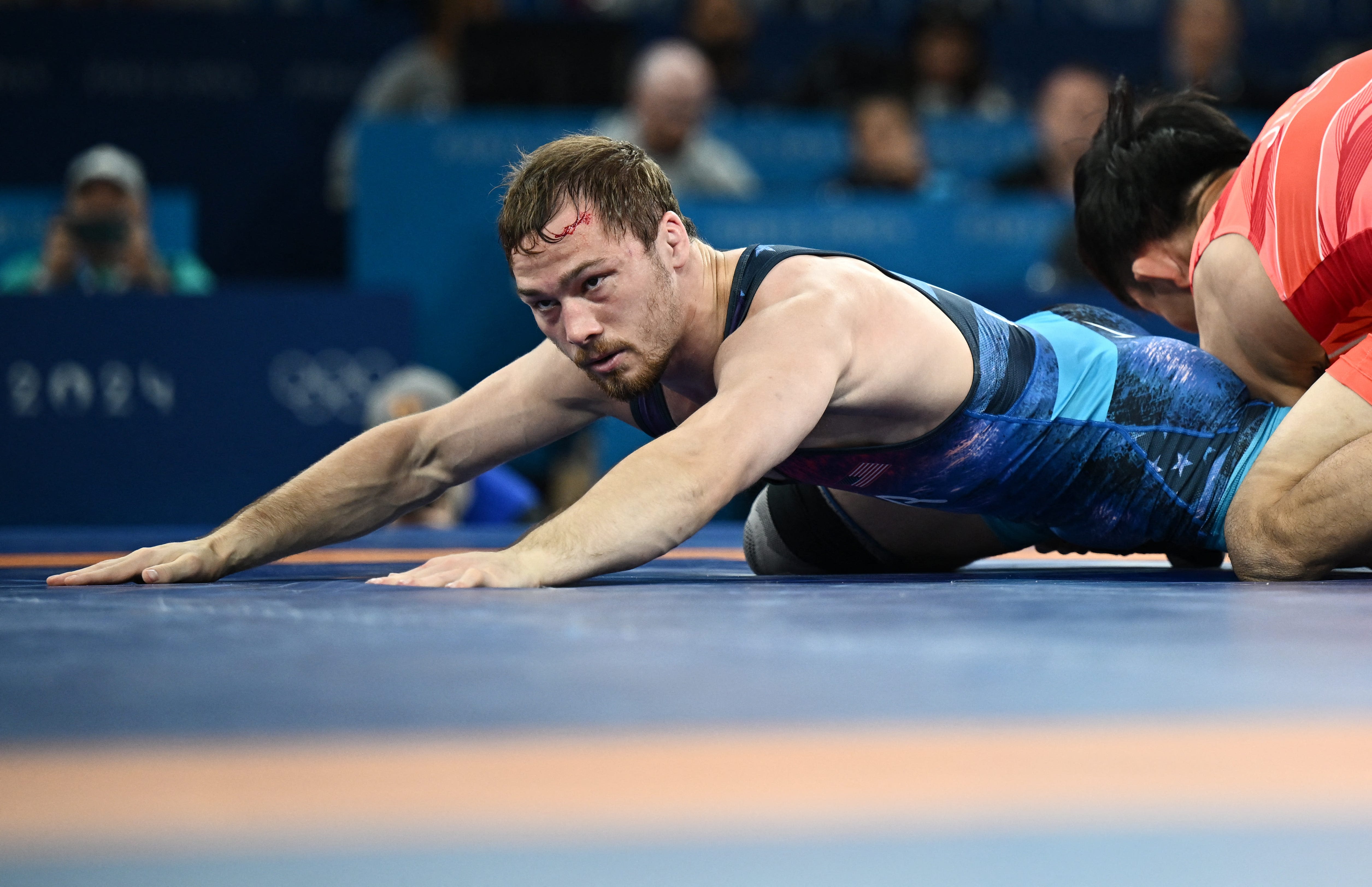 U.S. wrestler Spencer Lee vents his frustration after taking silver