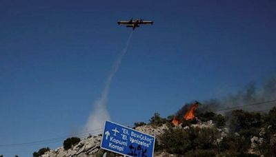 Wildfire rages outside Athens fanned by strong winds | World News - The Indian Express