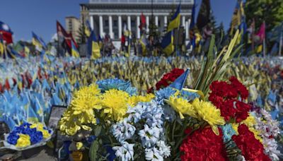 A precious moment in time of war: Flowers for a wife and daughter coming home to Ukraine