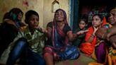 ‘The god took away my son’: Indians grieve after deadly stampede