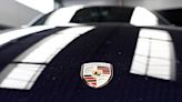 Porsche AG shares rise to top of DAX, traders point to pre-close call