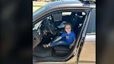 Eager young Iowa State Patrol fan gets tour of patrol car