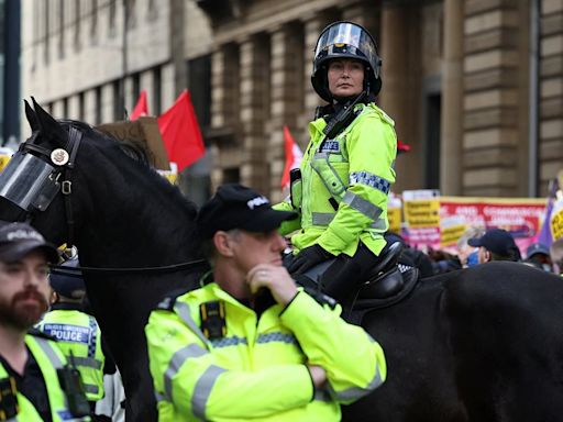 Riots break out in Manchester and Hull as tear gas is fired