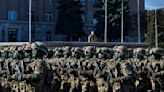 Azerbaijan's president addresses a military parade in Karabakh and says 'we showed the whole world'