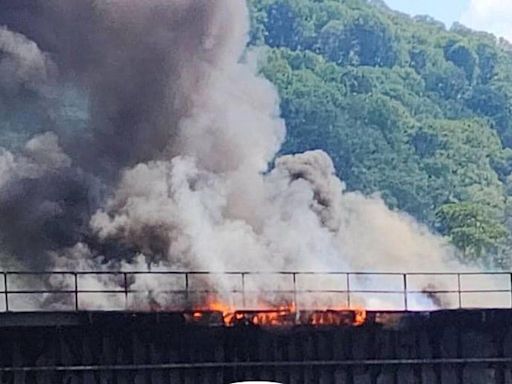 Railroad bridge over Potomac River closed to rail traffic after fire in middle of bridge