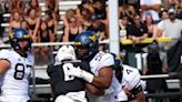 Yates' versatility has been crucial for WVU's offensive line