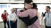 Family, friends welcome home Michigan doctor who was trapped in Gaza on medical mission