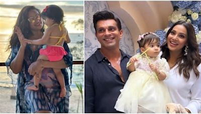 WATCH: Fighter star Karan Singh Grover does THIS to keep daughter Devi busy on flight; Bipasha Basu drops vacay pic