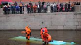 A bus plunges off a bridge in the Russian city of St. Petersburg, killing 7 people