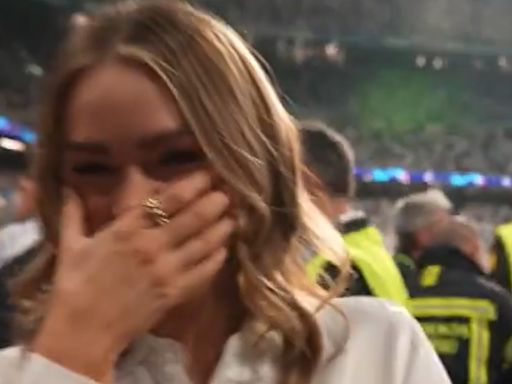 Laura Woods can't stop giggling as Rio Ferdinand is blanked by Real Madrid star