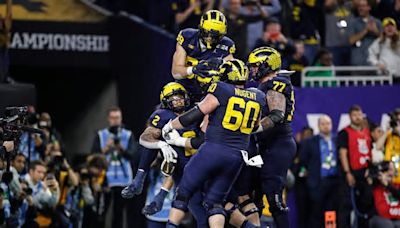 Michigan football national champs brought on stage at NFL draft to start Day 2 in Detroit