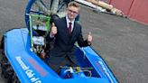 Teenager arrives at Year 11 Prom on custom made hovercraft